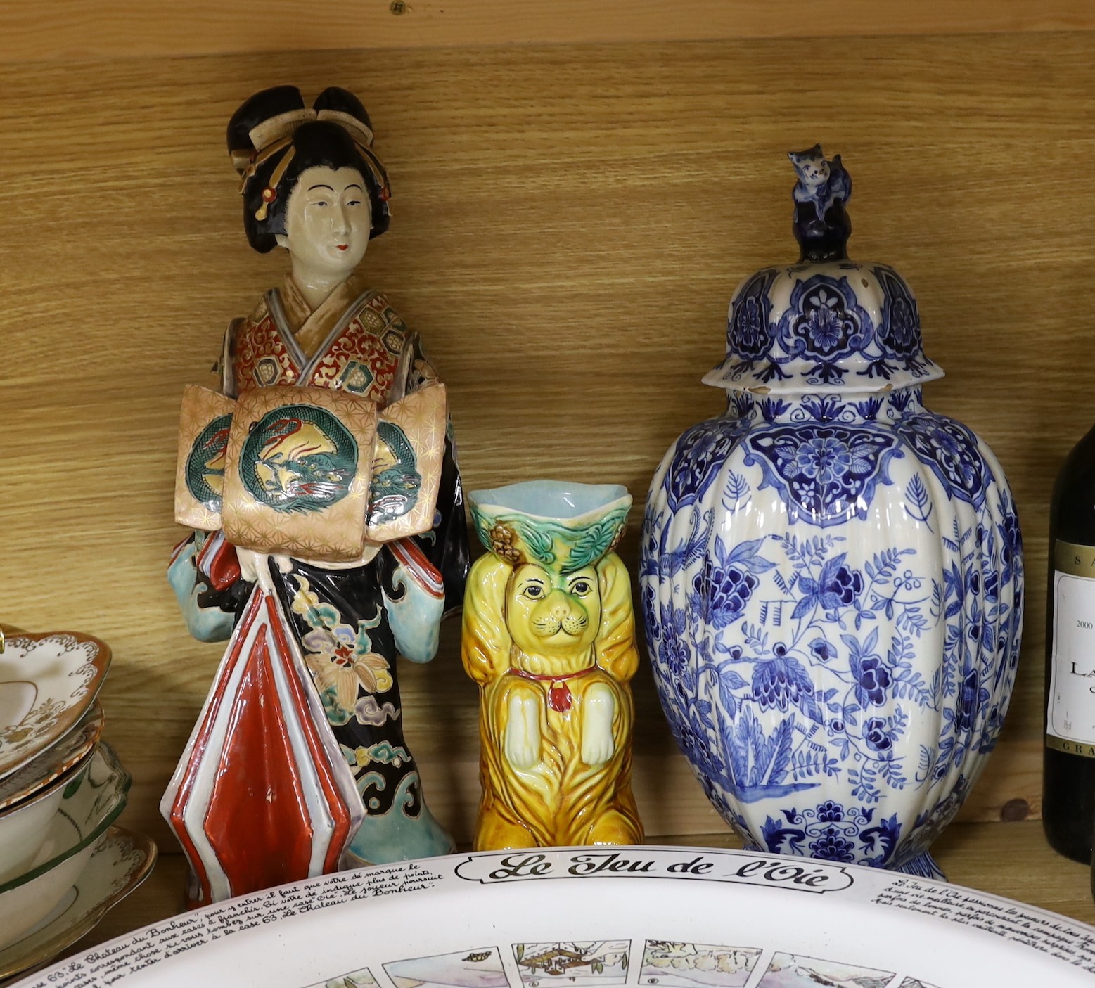 A large Japanese porcelain figure of a Bijin, 39cm high and a quantity of ceramics to include Delft, Doulton, Limoges, portmeirion and others